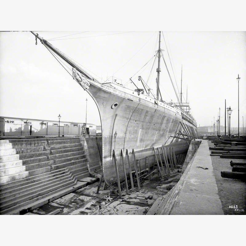 Port bow view in Alexandra Graving Dock for hull repairs and refitting