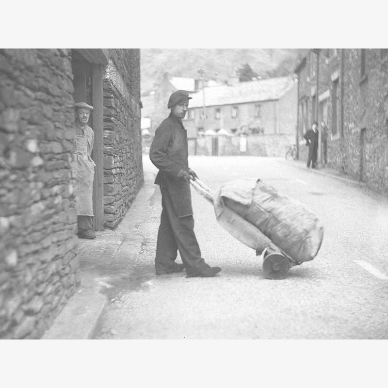 Boy Wheeling a Filled Sack at the Blue Works, Backbarrow