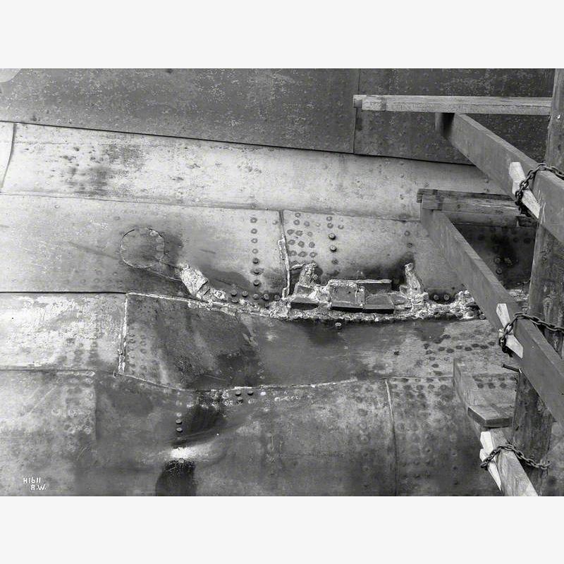 HMS 'Hawke' collision damage – boss plating showing temporary wedging in holes