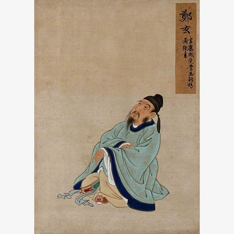A Seated Chinese Figure Wearing Pale Turquoise Coloured Silk Robes with an Indigo Border and Buff Undergarments