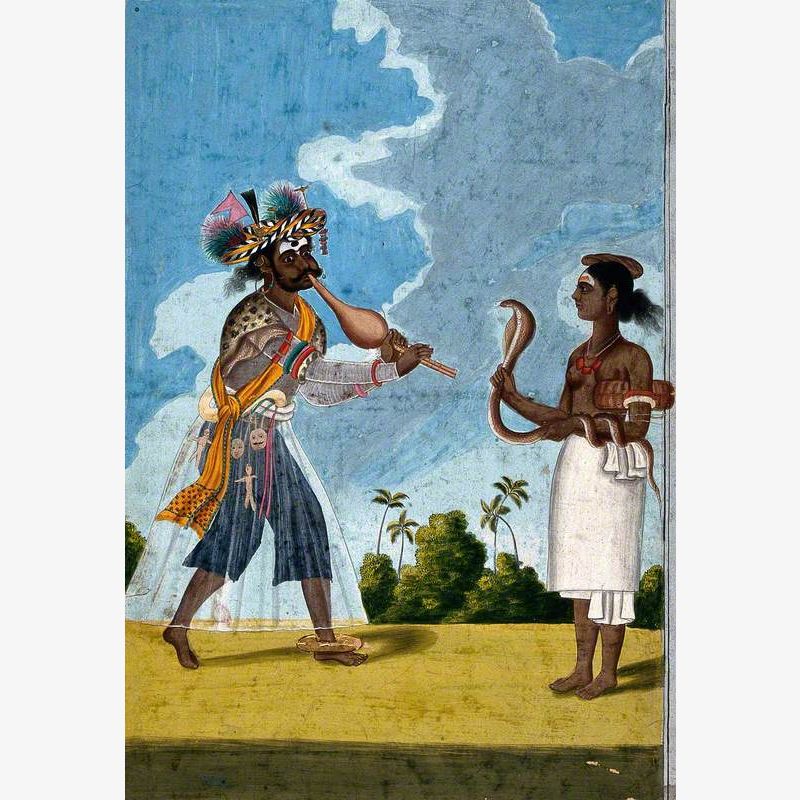 An Indian Snake Charmer Charming a Cobra Held by His Wife