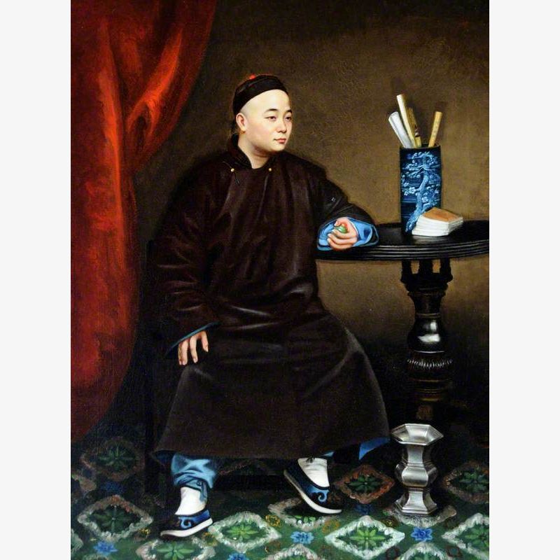 A Chinese National Holding a Snuff Bottle
