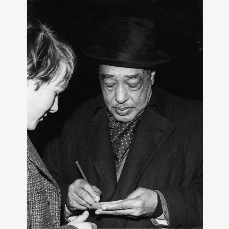 Duke Ellington (1899–1974), Signing His Autograph, c.1962