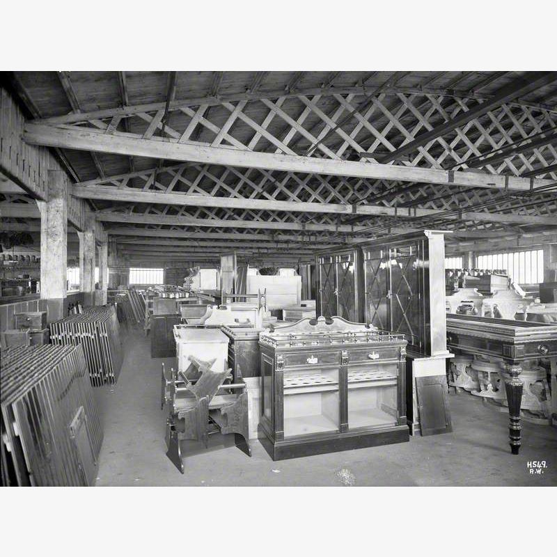 Joiner's work store interior, with stored furniture