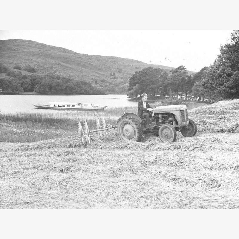 Tractor Turning Hay at Coniston